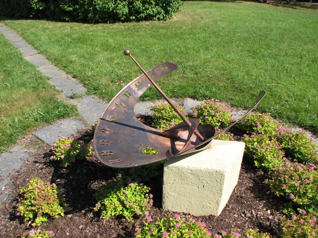 the sun clock in front of the observatory building